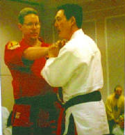 MASTER LEON JAY WORKING CHIN NA ON SENSEI KEVIN's WRIST