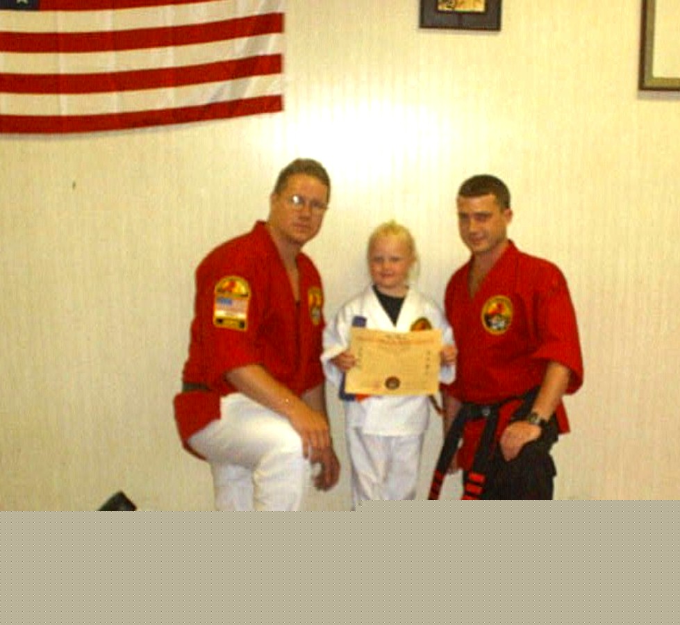 KAT EARNS HER PURPLE BELT 